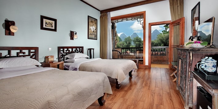 Yangshuo Mountain Retreat Yulong River corner room with oversize balcony.